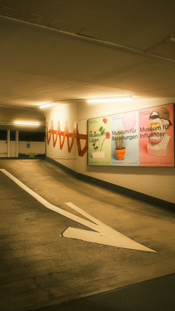 underground garage with museum posters