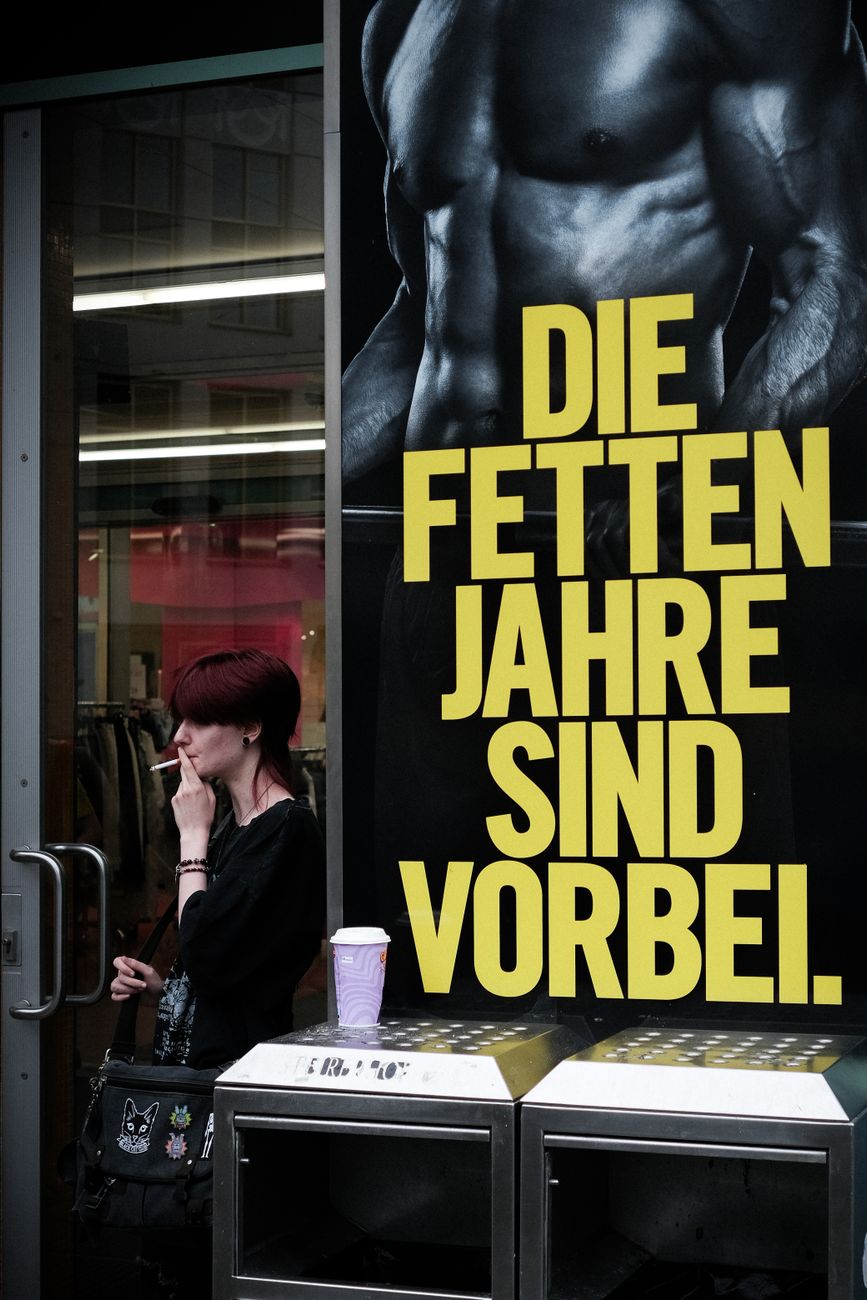 urban street scene with bold german billboard