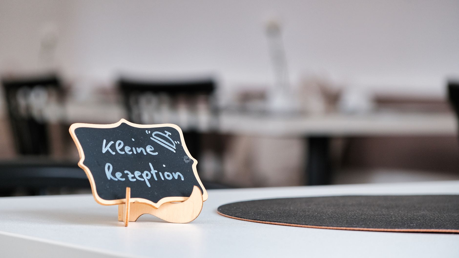 close up of a little board with information on a table