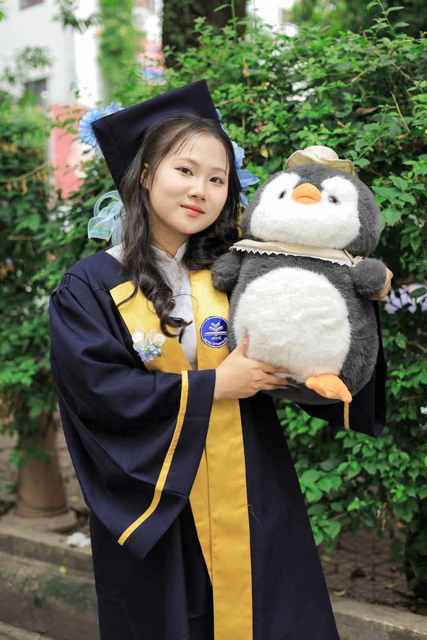 graduation celebration with plush toy in vietnam