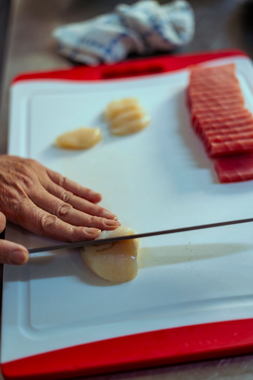 person holding hand on food