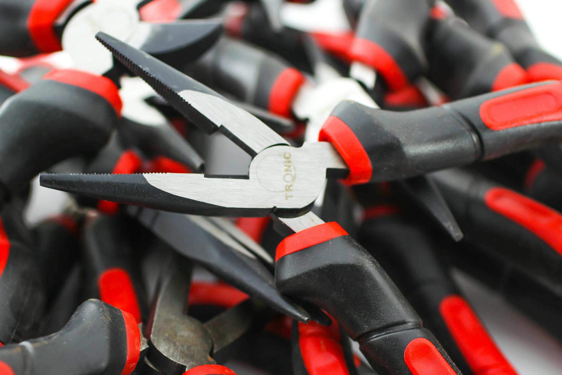 close up photo of a tronic needle nose pliers