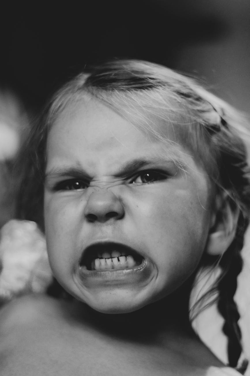 young girl with an angry face