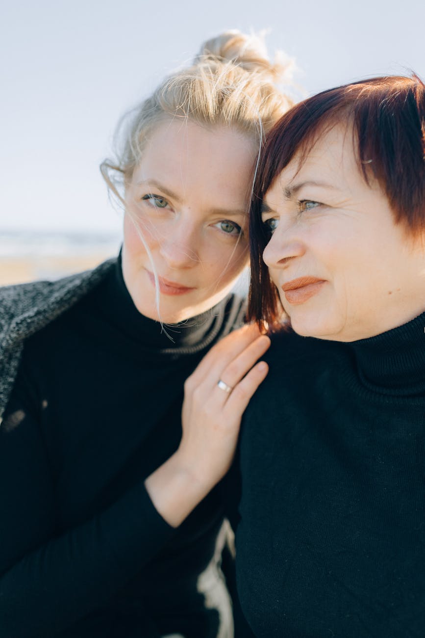 a woman leaning on her mother