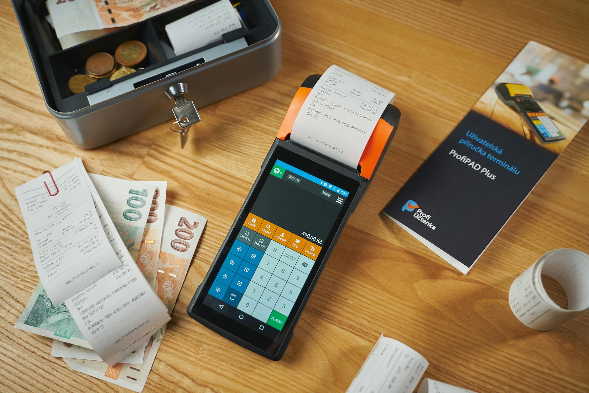 cash and payment terminal on table